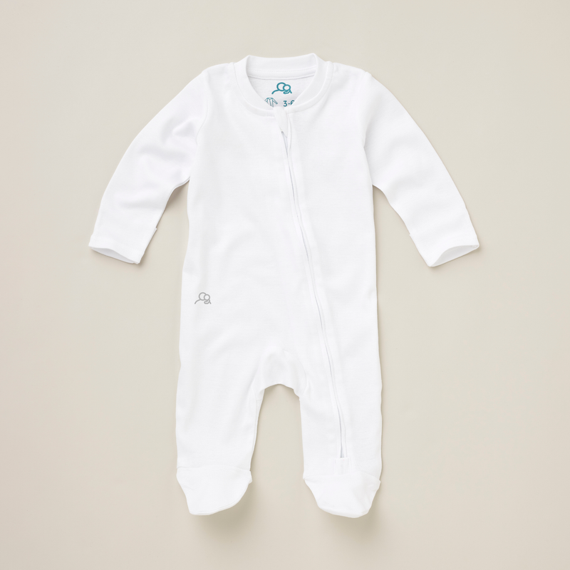 Singular white baby sleepsuit with small logo on right hip
